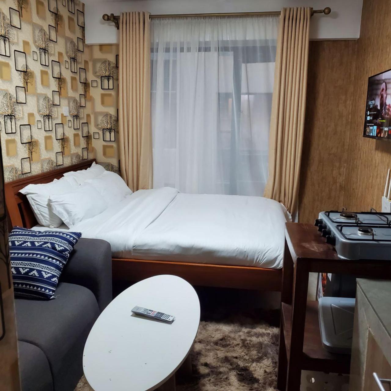 Appartamento Lovely & Cozy Compact Studio Near Airport With Rooftop View Nairobi Esterno foto