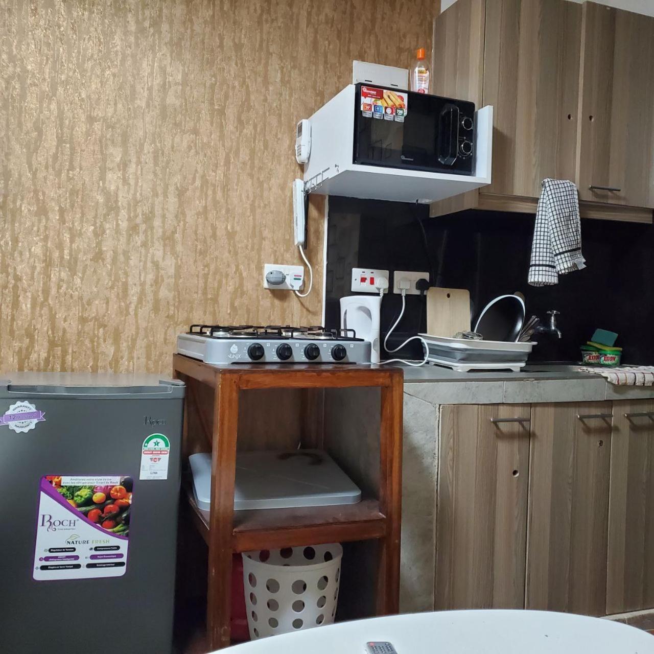 Appartamento Lovely & Cozy Compact Studio Near Airport With Rooftop View Nairobi Esterno foto